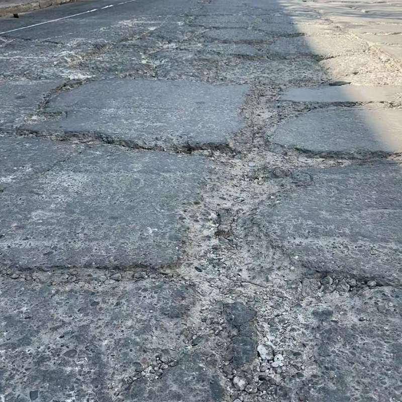 江源路面起砂露石子修补料
